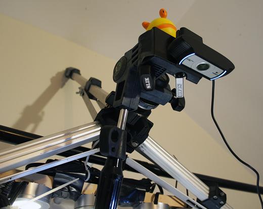 Pom Pom and the HD webcam perched on high, silently judging us all. HD webcam