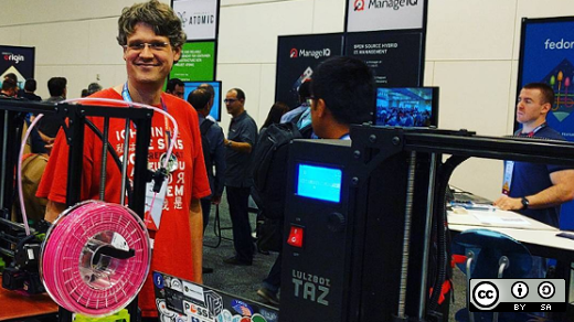 2016 Red Hat Summit booth with Tom Callaway and a Lulzbot TAZ 3D printer