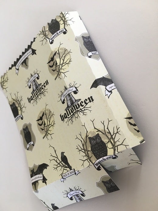 Paper with bats, owls, and Halloween banners Paper with bats, owls, and Halloween banners