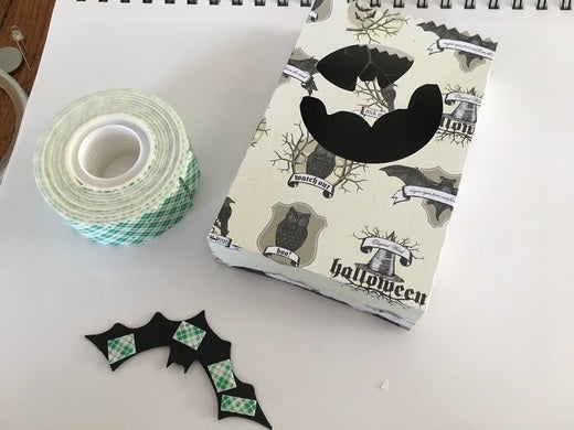 Attach bat to box. Attach bat to box.