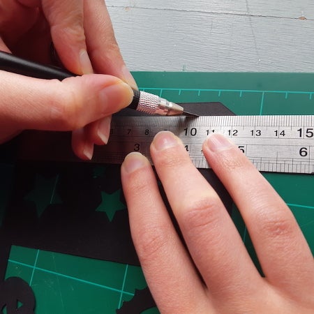 Cutting out the lantern